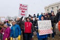 Protesters Hold Signs as Students Arrive at Rally